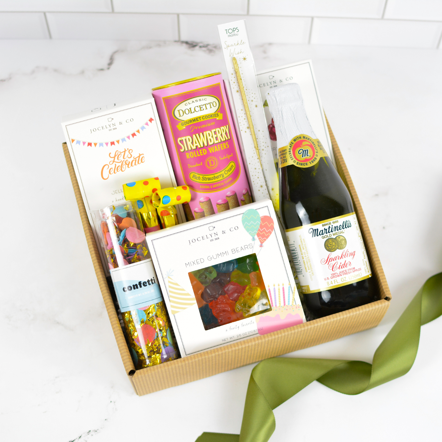 Let’s Celebrate gift box with sparkling cider, candy, and party favors